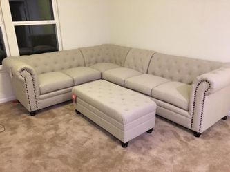 BRAND NEW SECTIONAL SOFA WITH OTTOMAN