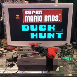 Regular Nintendo Console With 2 Controller And Original Duck Hunt Gun And Mario Game Included