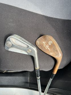 2 Golf Clubs  