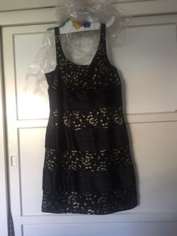 Cocktail dress fits size 12 to 14 label shows 16 will not fit 16. Worn 2 times has been cleaned at cleaners.
