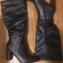 womens tall black boots 8.5, zips up, gently used, great condition