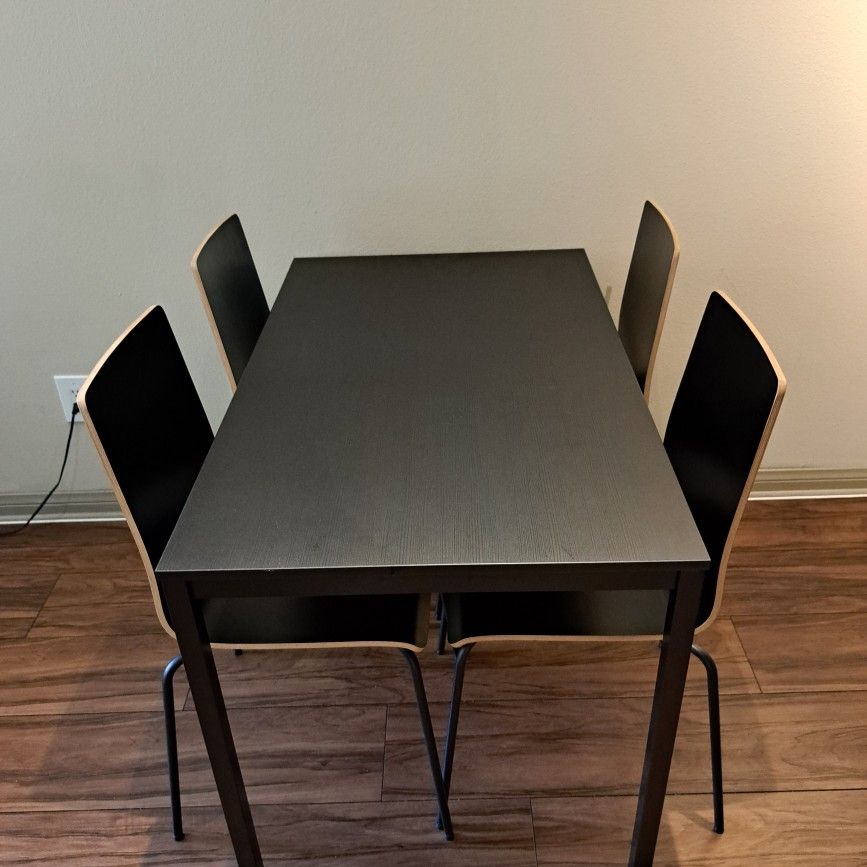 IKEA dining table TARENDO black and 4 chairs MARTIN black for Sale