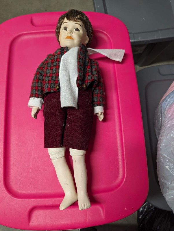 Vintage Anco Porcelain Boy Doll in Winter outfit.
