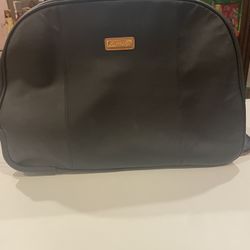 Joy and Iman Wheeled  Leather Carry On 