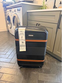 Brand New Rolling Suitcase