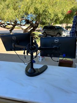 Good working " Dell" dual monitors with base