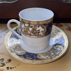 Vintage Porcelain Demitasse Cup and Saucer set with a blue and gold Greek-style design 