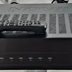 Nuvo Essentia Whole-Home Audio System, likely model NV-E6DM. 
Type: Multi-zone audio distribution amplifier.
Zones: Supports up to 6 different listeni