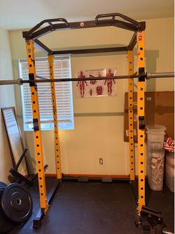 Weight lifting cage
