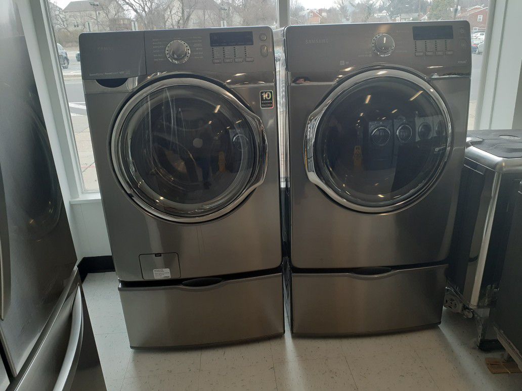 Samsung front load washer and gas dryer set with pedestal in good condition with 90 day's warranty