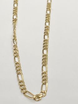 14k Solid Gold fígaro chain. Grams 5.2