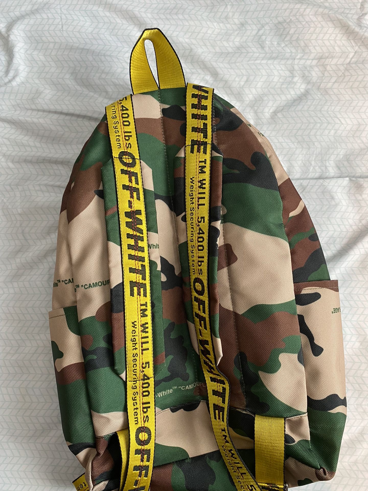 Off white camo backpack hotsell