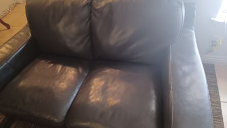 Dark brown love seat