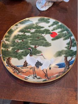 Beautiful hand, painted plate cranes