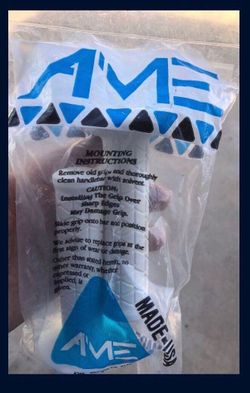A’ME NEW  WHITE GRIPS #2 With Raised Font Texture