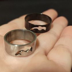 Two Matching Stainless Dolphin Band Rings Sizes 7 And 10