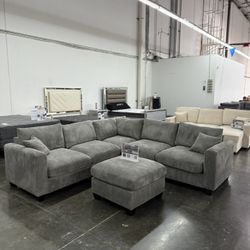 BRAND NEW GREY SECTIONAL COUCH WITH OTTOMAN(NEW IN BOXES)