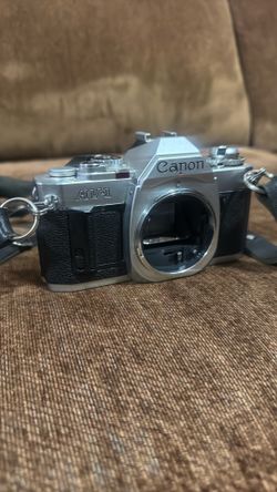 Canon AV1 with lens.