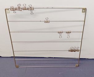 Metal
wall-mounted display rack or towel holder
