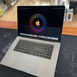 Apple MacBook Pro 15” 2019 i7 32GB RAM 256GB SSD Radeon PRO 555X 4GB Graphics!!!!