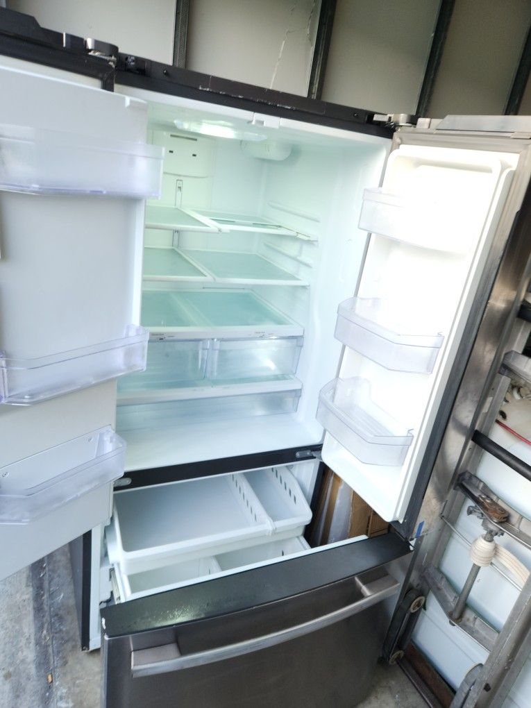 A refrigerator measuring 33 wide by 68 and a half high by 29 deep has an ice visor if it has a GE brand umbrella.