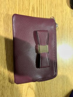 Woman wallet with bow tie