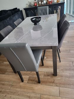 Gray marble dining table and 6 chairs