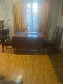 Table and two chairs