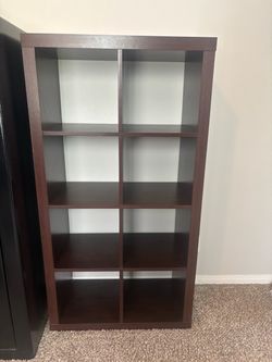 I have two, exactly the same. Priced as a set. Dark Brown 8-Cube Storage Bookshelf