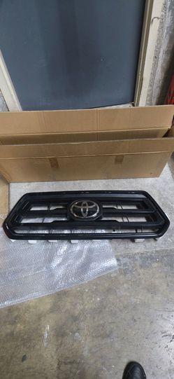 Toyota Tacoma front replacement grill OEM part