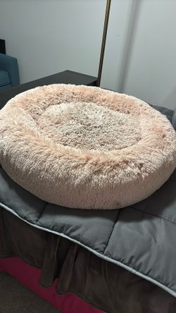 Large fluffy donut style dog bed