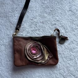 Brown leather wristlet