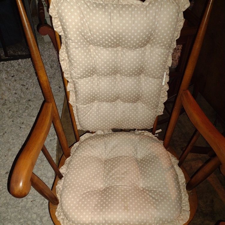 Nice Wooden Rocking Chair With Tan Cushions