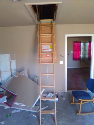 Photo Brand new spring loaded fold out attic ladder asking $100 obo