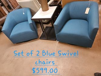 Chairs Set of 2 Blue Swivel Chairs We are located at 2811 East Bell road. Another Time Around Furniture.