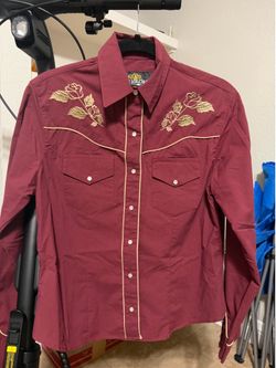 Woman’s denim shirt size L