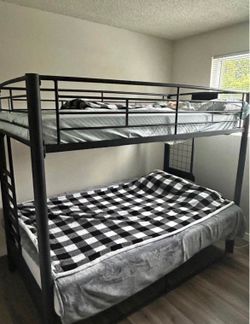 Black metal twin bunk bed