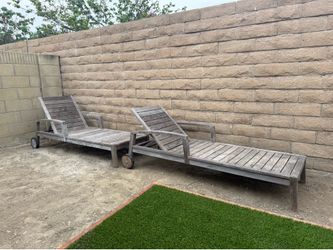Teak lounge chairs and side tables