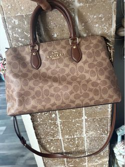 Coach Georgia Satchel in Signature Canvas with tan/brown coloring and gold-tone hardware. GUC, needs a little cleaning in the inside, other than that