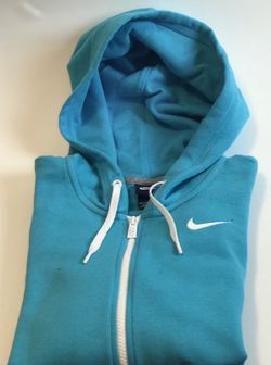 Nike hoodie turquoise blue size extra small and can fit a medium $25 firm