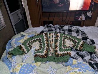 Handmade crochet items...blankets..sweaters...hats...scarves...shawls