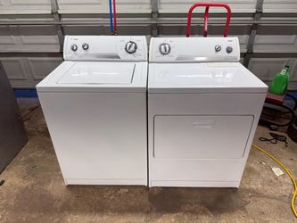 Whirlpool Heavy duty direct drive washing machine and electric 220v dryer.