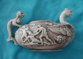 Antique serving bowl.
Austrian Amphora style mythological biscuit porcelain