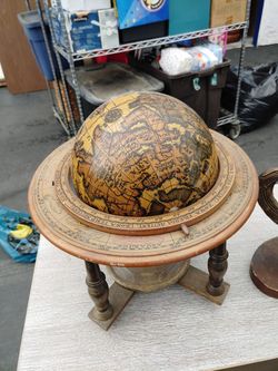 Globe and wooden horse