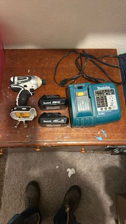 Makita Impact Drill 2 batteries  & charger