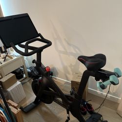 Peloton Bike+ And Weights. Large screen Model