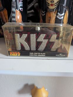 Glass Christmas ornament of the rock band Kiss