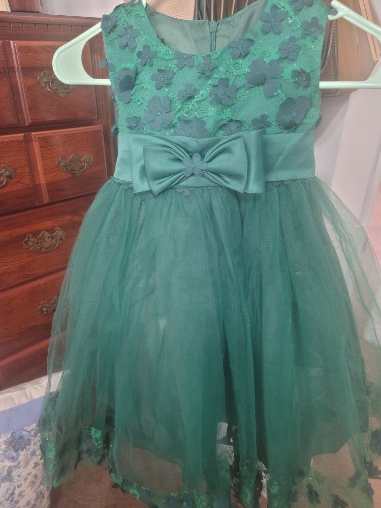 Beautiful hunter green with net and flowers girl party dress