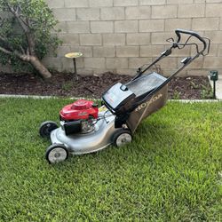 Lawn Mower (Just Serviced)  $350