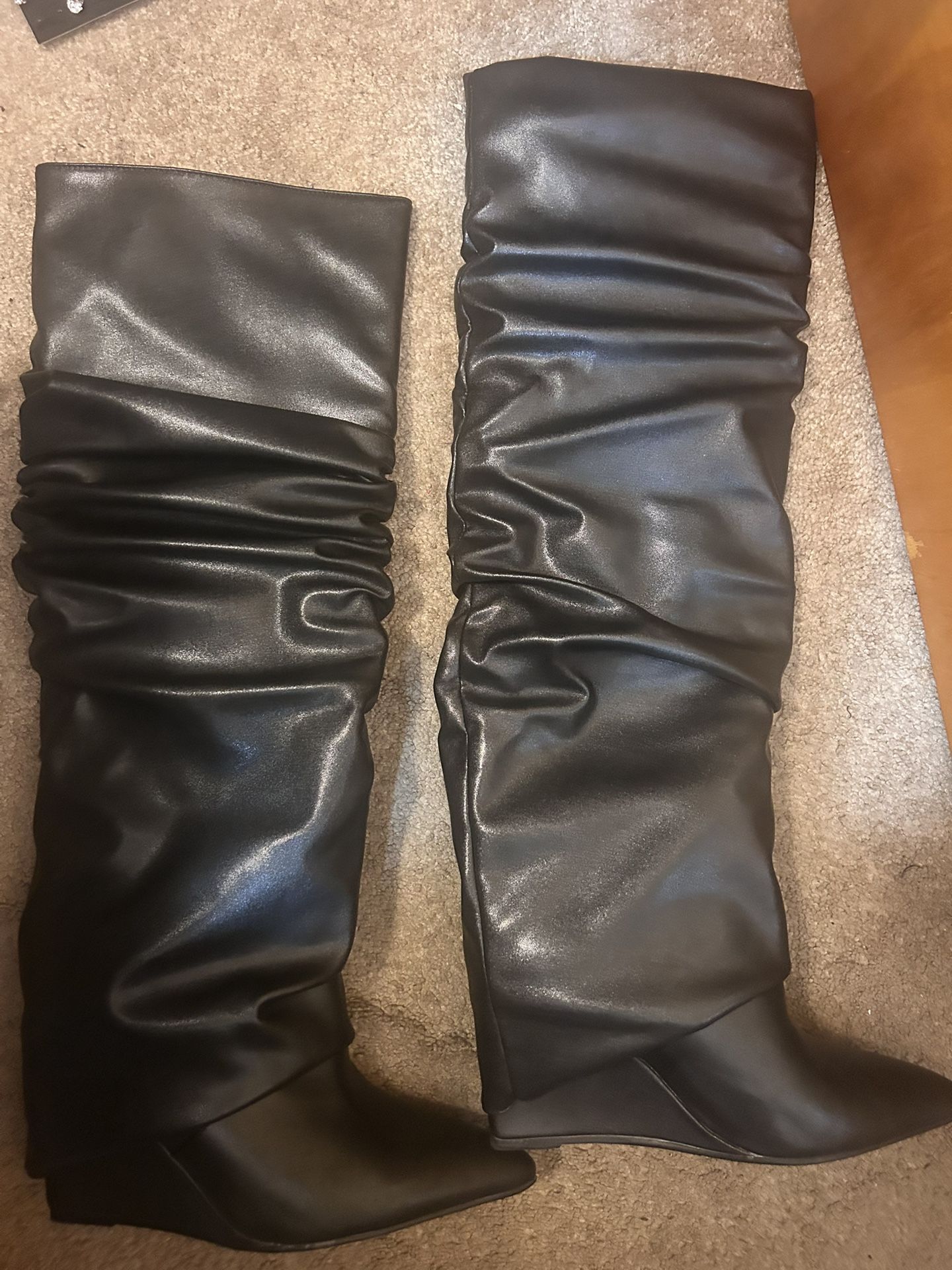 black heeled cuff over boots